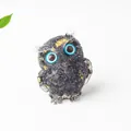 Dark grey resin owl statue with blue crystal eyes and gold spots for home decor - Obsidian