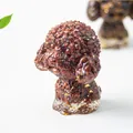 Macro shot of resin teddy dog figurine with red crystal stones and gold foil details - 6cmx3.4cmx4.7cm / Red Jasper