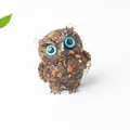 Brown resin owl figurine with blue eyes and gold foil inclusions for home desk decor - Tiger Eye Stone Bracelet