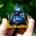 Detail of Orgone pyramid featuring Libra symbol, amethyst ball, and golden leaf accents - Libra / 5cm / 1.97in