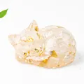 Sleeping cat crystal figurine with golden leaf flakes inside a transparent resin shell - White Crystal