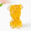 Amber crystal resin schnauzer dog figurine with detailed fur texture on white surface - Citrine