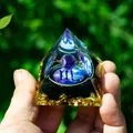 Detailed view of Scorpio resin pyramid with amethyst ball, gold foil and black obsidian stones - Scorpio / 5cm / 1.97in