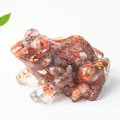 Cute frog figurine made of clear resin with red-brown crystal stones and gold foil flakes - Red Agate