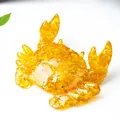 Translucent amber crab phone stand made of resin with natural crystal stones - Citrine