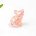 Detail of cute resin sitting cat ornament with pink crystal stones and gold leaf flakes - 3.2cm x 3.3cm x 4cm / Watermelon Quartz