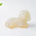 Top view of a translucent yellow crystal dog ornament with faceted resin texture details - Opal