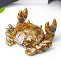 Crab phone stand made of tiger eye crystal gravel and gold foil in resin - Tiger's Eye