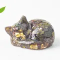 Sleeping cat statue crafted with clear resin, green aventurine chips, and gold foil accents - Dragon Blood Stone