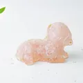 Detail of pink crystal resin sheep figurine with natural translucent stone texture - Rose Quartz
