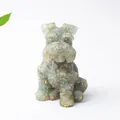 Green crystal Schnauzer dog figurine with gold foil flakes in sitting pose - Green Aventurine