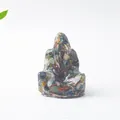 Vista detallada de estatua de Ganesha de resina rellena con piedras de cristal natural - Jaspe Oceánico Ganesha