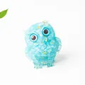 Light blue crystal owl ornament with gold foil inclusions and large rounded eyes - Aquamarine