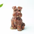 Reddish-brown Schnauzer dog ornament with gold foil texture on white background - Red Jasper