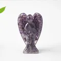 Handcrafted purple amethyst resin angel statue decoration with wings on white surface - Amethyst
