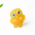 Amber crystal resin owl ornament with blue eyes and sparkling crushed stone texture - Citrine