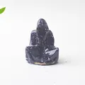 Vista detallada de figura de mago de cristal con textura azul oscuro de cielo estrellado - Piedra de Oro Azul Mago Fantasma