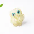 Owl resin figurine with yellow crystal chips, gold foil, and blue eyes for home decor - Lemon Yellow