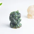 Macro shot of a Ruby in Zoisite hand-carved Chinese guardian lion figurine - Ruby Zoisite