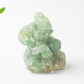 Close-up of green natural crystal stone resin elephant figurine for desk decor - Green Aventurine