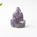 Macro view of purple crystal stone resin Ganesha statue with natural stone texture - Amethyst Ganesha