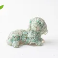Macro detail of dog figurine crafted with natural green crystal stones and clear resin - Amazonite