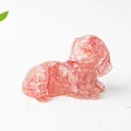 Detail of pink strawberry crystal dog figurine with internal crushed stone texture - Watermelon Quartz