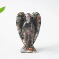 Resin angel figurine with colorful natural crystal stone chips on a white background - Ocean Jasper