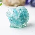 Detail of light blue translucent crystal resin cat ornament with fine fur texture - Aquamarine