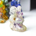 Translucent bunny resin ornament filled with purple and yellow natural crystal stones - Colorful Fluorite