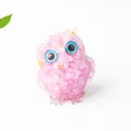 Pink crystal resin owl statue with gold foil fragments and big blue eyes for desk decor - Deep Rose Quartz