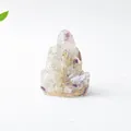 Estatua de Ganesha hecha de piedras de cristal natural y resina con acabado translúcido - Fluorita de Colores Ganesha