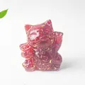 Translucent red resin lucky cat figurine with gold foil flakes on white background - Red Glass / 70x60x55mm