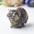 Detailed close-up of a resin cat figurine with natural crystal stone texture and fur detail - Dragon Blood Stone