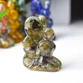 Artistic resin couple figurine with embedded green labradorite stones in abstract silhouette - Black Labradorite