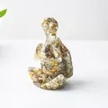Statue tortue yoga en résine avec remplissage de cristaux naturels jaunes et bruns - Agate Folle