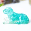 Lying puppy figurine made of blue natural crystal stone chips and transparent resin - Aquamarine