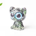 Cute resin cat figurine with green and purple natural crystal stones and big blue eyes - Ruby Zoisite
