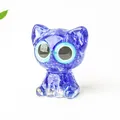 Handcrafted dark blue resin cat figurine with natural crystal stone texture and large eyes - Blue Glass