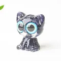 Sparkling dark blue resin cat figurine with large blue eyes and starry glitter finish - Blue Sandstone