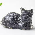 Lying cat ornament in deep black resin with textured fur detail for desk decor - Obsidian