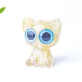 Cute warm yellow resin cat figurine with natural crystal stone infills and blue eyes - Yellow Agate