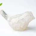 Artistic translucent white resin crystal bird statue with natural stone texture detail - White Crystal