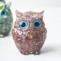 Figurine de chouette faite de copeaux de cristal violet en résine aux yeux bleus - Quartz Fraise