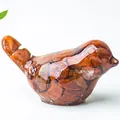 Artistic resin bird figurine with natural red jasper stone chips and smooth finish - Red Jasper