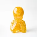 Modern resin statue with amber crystal stones in humanoid shape for home desk decor - Citrine