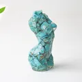 Artistic female torso sculpture crafted from resin and teal natural crystal stones - Turquoise