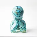 Minimalist resin statue with turquoise stones in a round humanoid shape for desk decor - Turquoise
