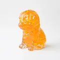 Resin crystal dog figurine in bright amber orange with unique ice crackle texture - Citrine
