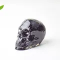 Figura de calavera de cristal negro pulido para decoración de escritorio con acabado brillo - Obsidiana